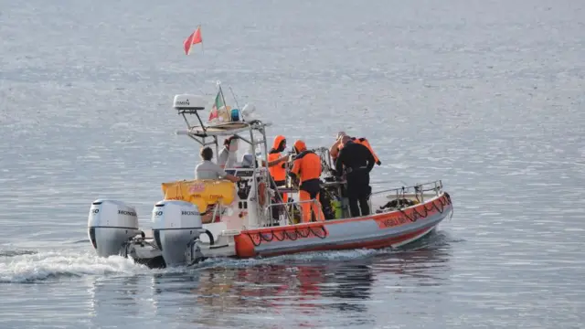 An Italian Coastguard boat heads out to the site of the Bayesian on the fourth day of the search