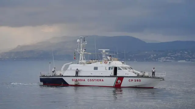 An Italian Coastguard boat heads out to the site of the Bayesian on the fourth day of the search