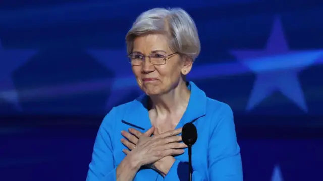 U.S. Sen. Elizabeth Warren (D-MA) gestures on the stage on Day 4 of the Democratic National Convention (DNC) at the United Center, in Chicago, Illinois, U.S., August 22, 2024.