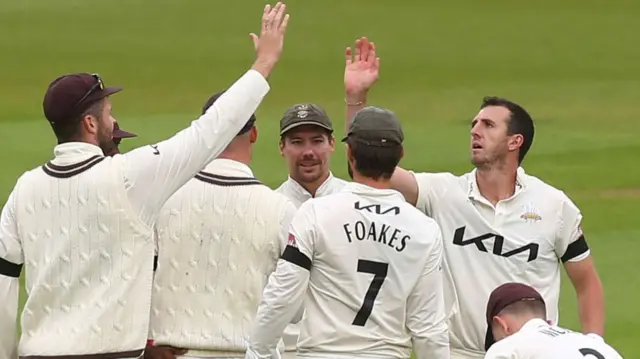 Dan Worrall takes a wicket for Surrey