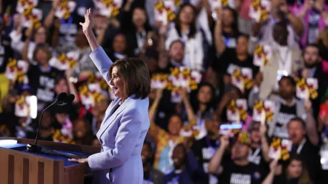 Description U.S. Representative Nancy Pelosi (D-CA) gestures onstage on Day 3 of the Democratic National Convention (DNC) at the United Center, in Chicago, Illinois, U.S., August 21, 2024.