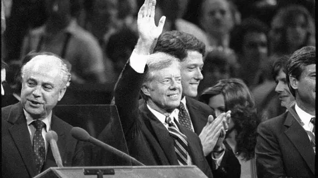 President Jimmy Carter waves to the crowd at the DNC in 1980 after then-Arkansas governor Bill Clinton nominated him at the convention