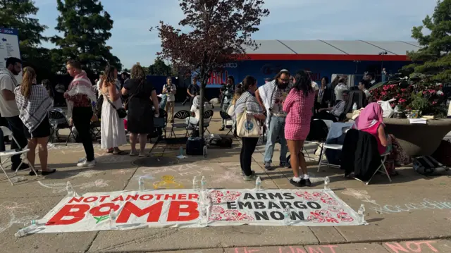 Uncommitted delegates gather outside the DNC