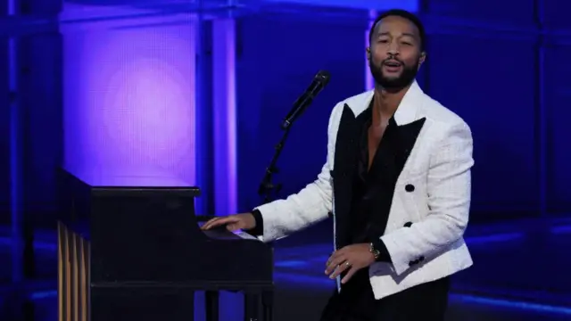 John Legend performs on Day 3 of the Democratic National Convention (DNC) at the United Center, in Chicago, Illinois, U.S., August 21, 2024.