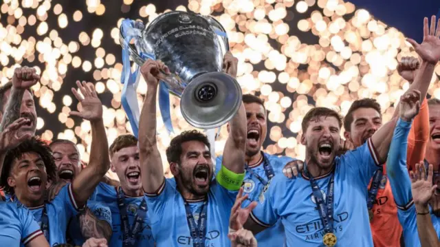 Ilkay Gundogan lifting the Champions League trophy