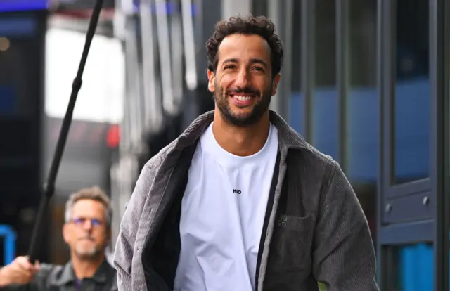 Daniel Ricciardo walks through the paddock in Zandvoort