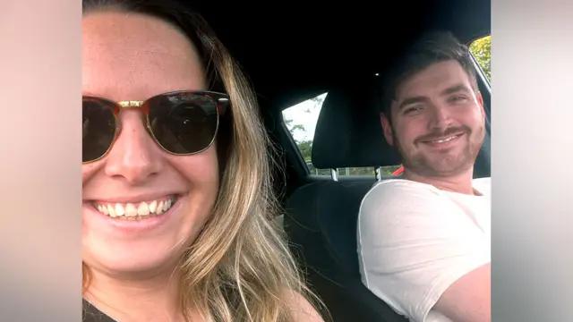 Tegan Mcivor and her partner Billy in a car