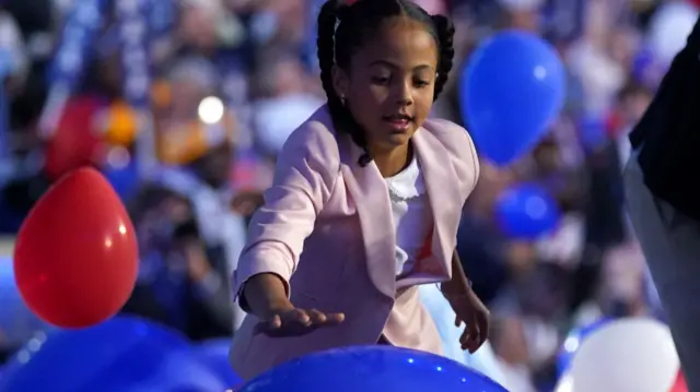 Kamala Harris' great-niece Amara is having some fun playing with the balloons