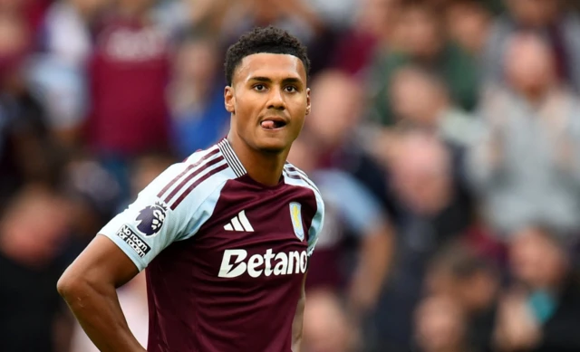 Aston Villa's Ollie Watkins reacts after missing a chance