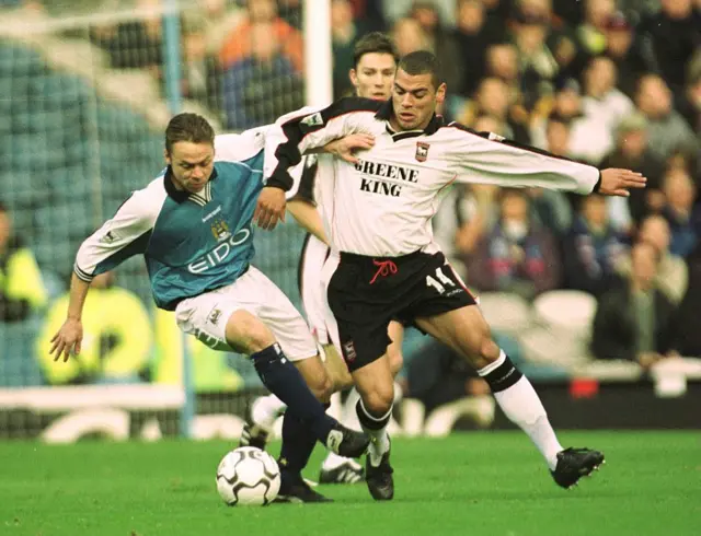 Dickov and Wright battle for the ball