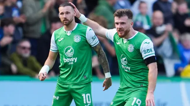 Martin Boyle (left) celebrates