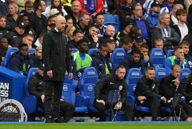 Ten Hag watches on from the bench