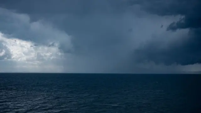 Storm clouds over the sea off coast of Italy