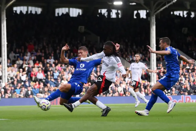 Alex Iwobi scores