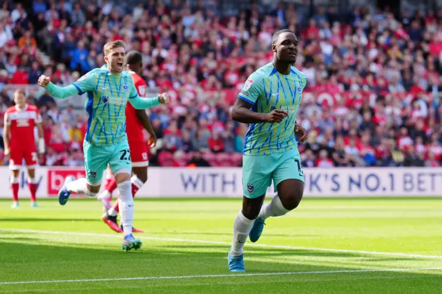 Portsmouth's Christian Saydee celebrates after scoring