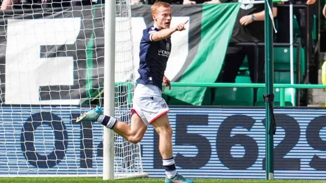 Scott Tiffoney celebrates