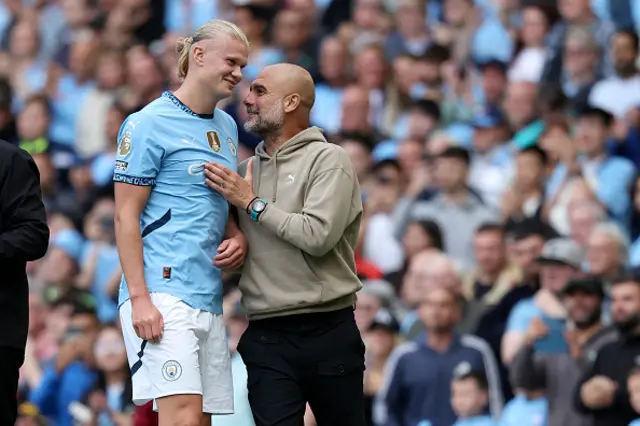 Erling Haaland of Manchester City and Pep Guardiola