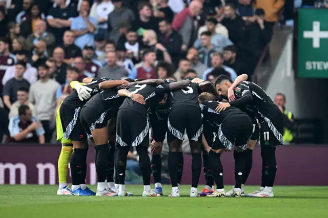 Players of Arsenal huddle