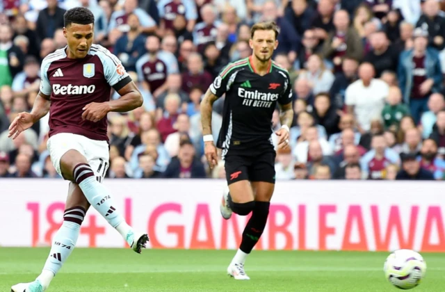 Ollie Watkins reacts after missing a chance