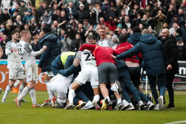 Swansea celebrate derby win over Cardiff last season