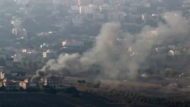 Smoke rising from a Lebanese town