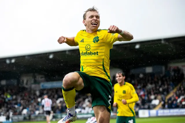 Alistair Johnston celebrates after scoring for Celtic against St Mirren