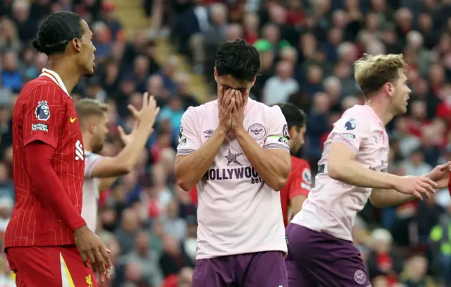 Norgaard holds his head in his hands after missing chance