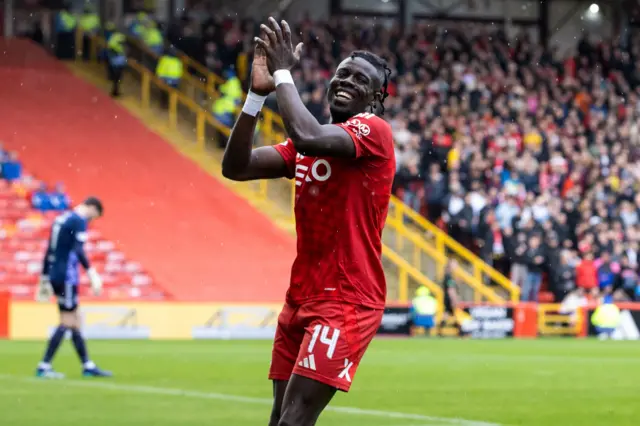 Aberdeen forward Pape Habib Gueye celebrates