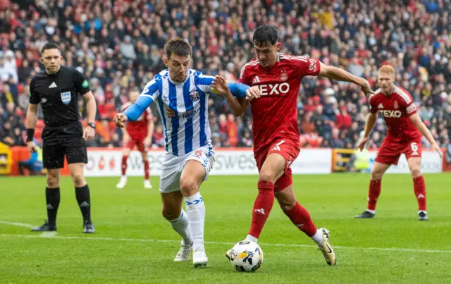 Kilmarnock's Brad Lyons and Aberdeen's Jamie McGrath