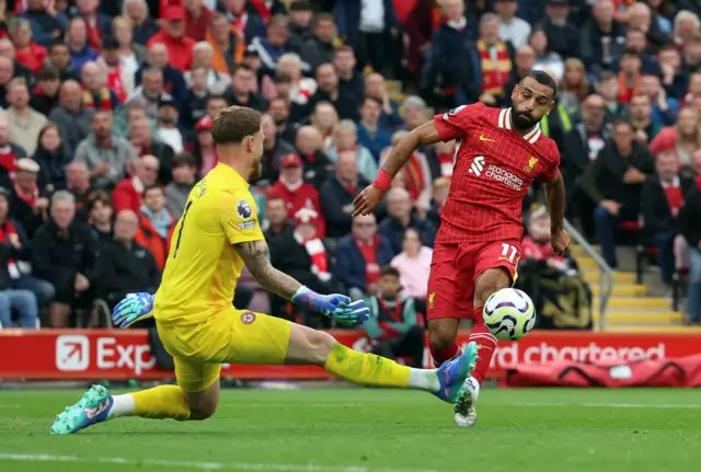 Salah curves the ball past Flekken to extend Liverpool's lead