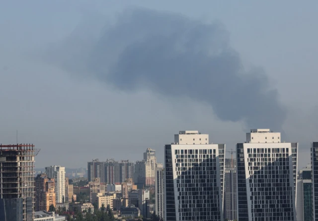 Smoke rises over Kyiv