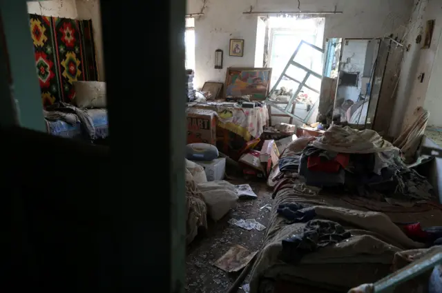 A damaged room after a missile and drone strike