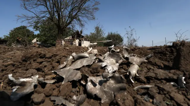 The rocket debris collected at the site of a rocket hit in a village