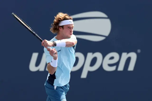 Andrey Rublev of Russia returns against Thiago Seyboth Wild of Brazil