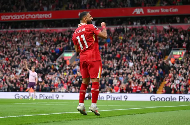 Mohamed Salah celebrates scoring for Liverpool