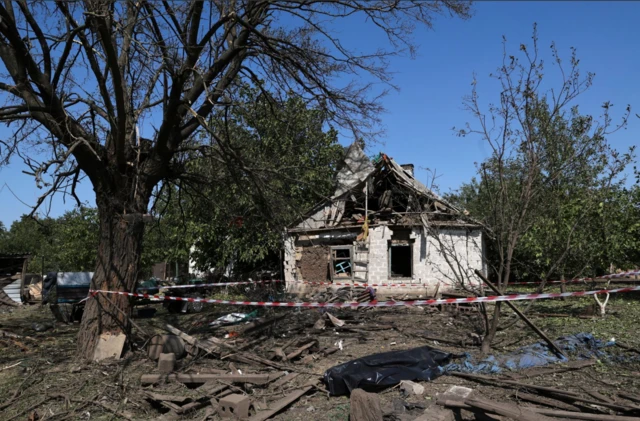 A house damaged by drones and missile strikes