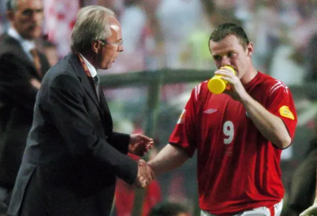 Sven Goran Erikkson (R) shakes hands with Wayne Rooney