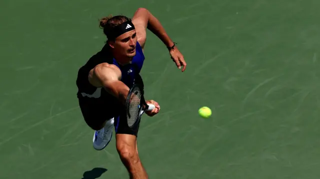 Alexander Zverev returns serve at the US Open