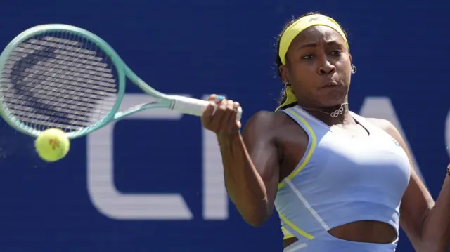 Coco Gauff plays a forehand at the US Open