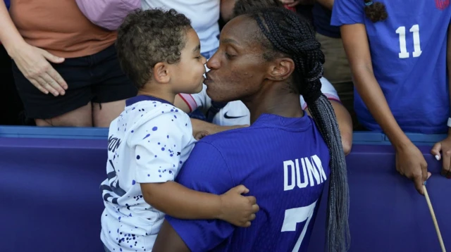 Crystal Dunn and her son Marcel