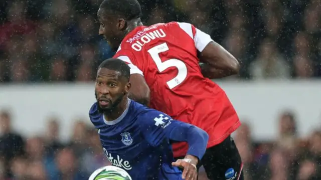 Beto of Everton and Joseph Olowu of Doncaster Rovers