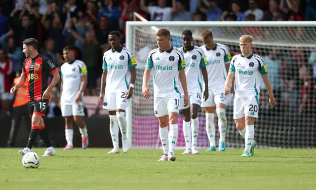 Dejection for Newcastle players looks on