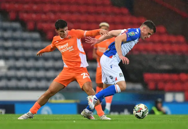 Blackpool's Rob Apter battles with Blackburn Rovers' Jack Vale