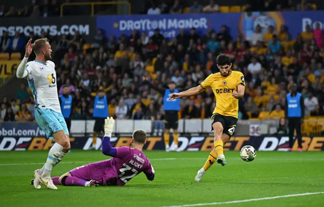 Goncalo Guedes of Wolverhampton Wanderers scores