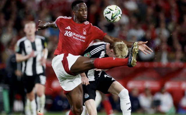 Willy Boly in action with New Willy Boly in action with Newcastle United's Anthony Gordon