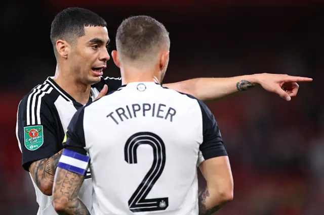 Miguel Almiron instructs Kieran Trippier of Newcastle United