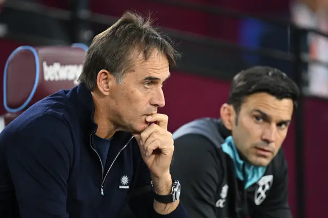 Julen Lopetegui, Manager of West Ham United, (L) looks on