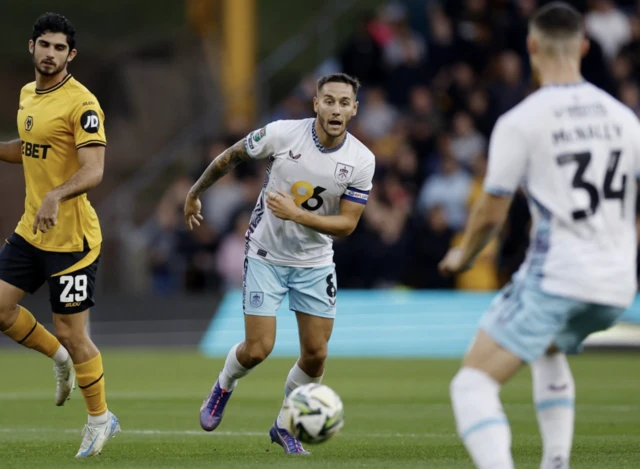 Josh Brownhill eyes the ball