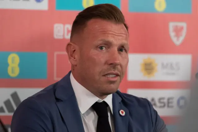 Wales coach Craig Bellamy speaking at a news conference