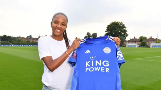 Shana Chossenotte poses with Leicester shirt